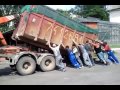 hook lift truck loading up a container funny video