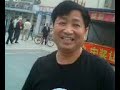 51 year old Chinese man riding a Bmx