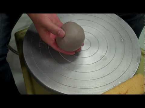 center - An instructional demonstration on how to center one pound of clay, on the potters wheel.
