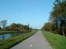 Cycle path separated by canal from road. Assen, Netherlands Cycle path separated by canal from road. Assen, Netherlands