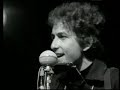 bob dylan - chimes of freedom 1964 live

far between finished sundown's an' midnight's broken toll
we ducked inside the doorway as thunder went crashing
as majestic bells of bolts struck shadows in the sounds
seeming to be the chimes of freedom flashing
flashing for the warriors whose strength is not to fight
flashing for the refugees on the unarmed road of flight
and for each an' ev'ry underdog soldier in the night
and we gazed upon the chimes of freedom flashing.

through the city's melting furnace, unexpectedly we watched
with faces hidden while the walls were tightening
as the echo of the wedding bells before the blowin' rain
dissolved into the bells of the lightning
tolling for the rebel, tolling for the rake
tolling for the luckless, the abandoned an' forsaked
tolling for the outcast, burnin' constantly at stake
and we gazed upon the chimes of freedom flashing.

through the mad mystic hammering of the wild ripping hail
the sky cracked its poems in naked wonder
that the clinging of the church bells blew far into the night
leaving only bells of lightning and its thunder
striking for the gentle, striking for the kind
striking for the guardians and protectors of the mind
and the unpawned painter behind beyond his rightful time
and we gazed upon the chimes of freedom flashing.

through the wild cathedral evening the rain unraveled tales
for the disrobed faceless forms of no position
tolling for the tongues with no place to bring their thoughts
all down in taken-for-granted situations
tolling for the deaf and blind, tolling for the mute
tolling for the mistreated, mateless mother, the mistitled prostitute
for the misdemeanor outlaw, chased and cheated by pursuit
and we gazed upon the chimes of freedom flashing.

tolling for the searching, on their speechless, seeking trail
for the lonesome-hearted lovers with too personal a tale
and for each unharmful, gentle soul misplaced inside a jail
and we gazed upon the chimes of freedom flashing.

starry-eyed and laughing as i recall when we were caught
trapped by no track of hours for they hanged suspended
as we listened one last time an' we watched with one last look
spellbound an' swallowed 'til the tolling ended
tolling for the aching ones whose wounds cannot be nursed
for the countless confused, accused, misused, strung-out ones and worse
and for every hung-up person in the whole wide universe
and we gazed upon the chimes of freedom flashing.