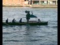 The Holly Man approaches on the Thames