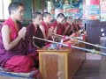 Tibetan and Nepalese Nuns singing, Nagi Gompa, Nepal