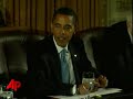 Raw Video: Obama Travels, Gathers With Aides