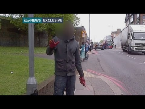 Woolwich attack: Man with blood on hands holds knife at Woolwich attack scene (ITV News)
