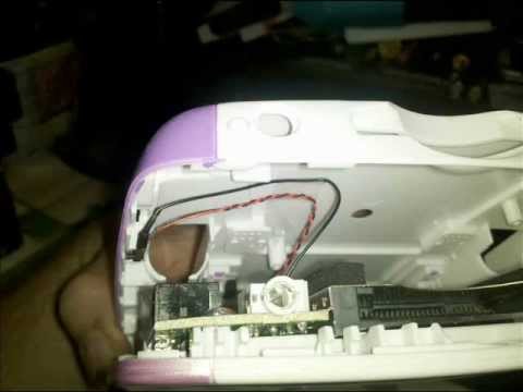how to open battery door on leapster gs