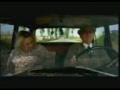 women driving a car tricks man