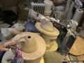 puting a handel on ship shape oil lamp with top knot