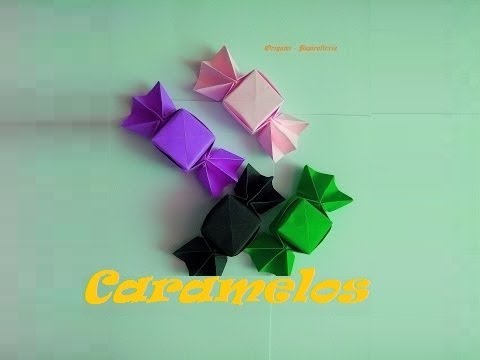 Как сделать из бумаги оригами конфету видео Как сделать из бумаги оригами конфету видео