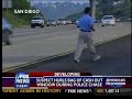 DRUG DEALER THROWING CASH FROM WINDOW DURING POLICE CHASE. PEOPLE RUN INTO STREET FOR MONEY