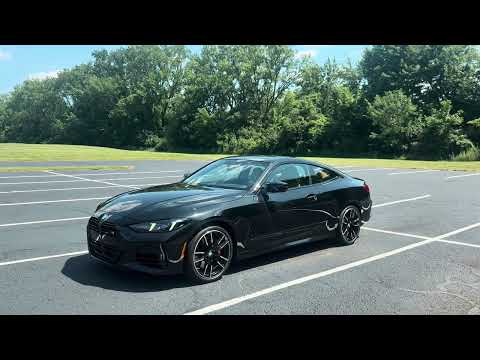 Used 2025 Black BMW M440i xDrive image 1