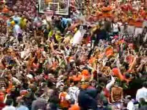 Syracuse storms the court.