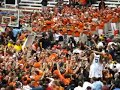 Syracuse storms the court.