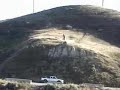 Insane dude jumps over a road with his bike Insane dude jumps over a road with his bike