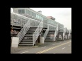 Newsman falls down stairs