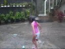 Izzy and Tyrone playing in the rain