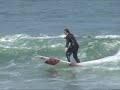 Now that's surfing with a suit