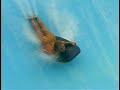 Beautiful Woman On A Boogie Board Breaks Waves