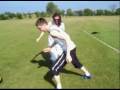 Voy Greg Dot on football pitch