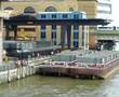 Freight barges being... :: Freight barges being loaded on the Thames