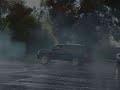 Escalade Having Fun On Wet pavement