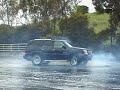 Escalade Having Fun On Wet pavement Escalade Having Fun On Wet pavement