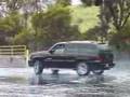 Escalade Having Fun On Wet pavement