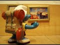 Smurfs around the World: Holland. See how two traveller smurfs visit Amsterdam; there they went to the Rijksmuseum, the Van Gogh museum, the Anne Frank House, the flowers market with lots of tulips, they take a cruise, they went to The Dam and also to the red light district. Then they visited De Zaanse Schans, where they visited the windmill of the Cat, a wooden shoes factory and a cheese factory. After that they visited Edam. Finally they took a plane back to their Mushroom Village.