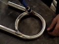 On the Ground Performance pulse tig welding a 360 degree chromoly driveshaft safety loop.