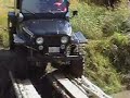 Jeep CJ over logs