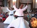 the whirling dervishes are a sect of islam taught to love everything.  they dance while the musicians play.  the dervishes allow outsiders to view their religious ceremony. this was filmed at the istanbul train depot (last stop of the orient express).