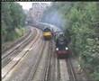 34016 Bodmin racing a Class 58 near Putney Station
