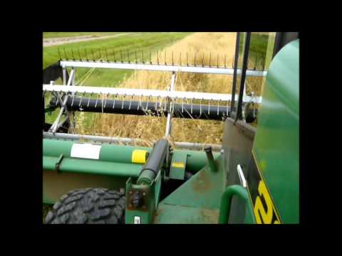 swathing - Swathing some more oats in September 2012. Various viewing angles of the 2360 John Deere at work.