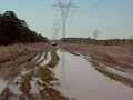 ford bronco on 37" super swamper boggers mudding in traskwood arkansas