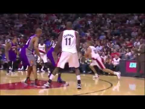 Nicolas Batum dunks over Jared Dudley