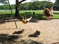 Andrew & Britney on the swings at Father Mac\