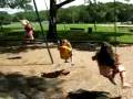 Andrew & Britney on the swings at Father Mac's