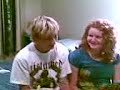 Two weird people singing badly
