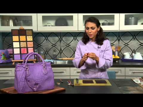 fondant suitcase cake - Elisa Strauss of Confetti Cakes shows how to achieve the look of distressed leather (and talks about other textures) in this video from Craftsy.com 50% off t...