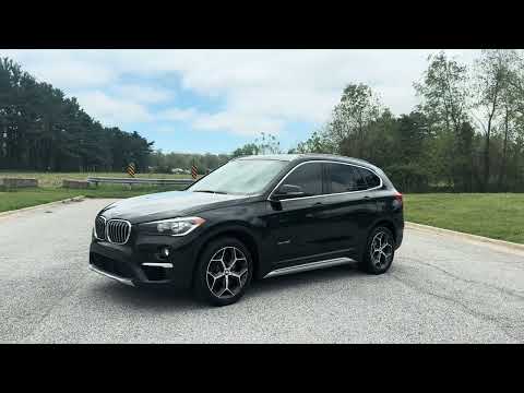 Used 2018 Black Sapphire Metallic BMW xDrive28i image 1