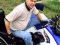 Quadriplegic transfers onto an ATV 4-Wheeler