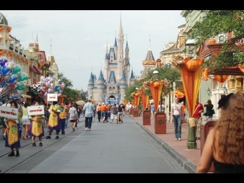 Main Street USA - Walking down Main Street at Magic Kingdom in Florida WDW. Instead of being a replica of a small Midwestern American town, Main Street at Magic Kingdom featur...