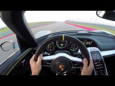 long - Multi-time Champion Patrick Long, Porsche Works Driver, utilizes all the systems of the new plug-in hybrid Porsche 918 Spyder for a hot lap of the new Circui...