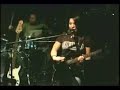 Caitlin on drums playing guitar and singing an original song