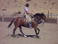 Jeremy Dunn and Ojos loping and working on moving shoulders and hind end, softness and such.