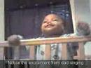 Preemie Twin eats wooden crib