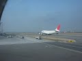 Waiting for take off at Bangkok Airport as JAL flight begins it\
