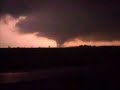 This is the tornado that struck Waldron on June 3rd 2008 around 8PM. We cut through the storm front before the tornado formed and stopped in a driveway about a mile south of the tornado's path to film. It touched down about half a mile east of my Mom's house near CR500E and continued eastward through the north edge of the town of Waldron hitting several homes and barns. It's really spooky to be able to see and hear a tornado from the distance we were able too. Less than a mile away from what I figured. I do have to say, no, it did not sound like a train. I want to say thanks to the folks who let us stop and take shelter in their house. Gavyn had fun playing with their two girls and excited lab. I also want to add that, again, I'm sorry for accidentally kicking your cat as we all hurried inside. I don't think she was hurt by any means.