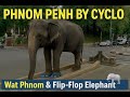 Cambodia: Cyclos, Wats & River Traffic in Phnom Penh