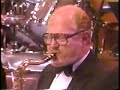 this is great and worth viewing even though the begining 5 seconds are missing. full orchestra with solo's by pete candoli, graham young, al aarons,oscar brashear, bill watrous, and don menza, etc.
